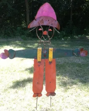 55"H x 50"W Bright Colored Scarecrow decorative plants  