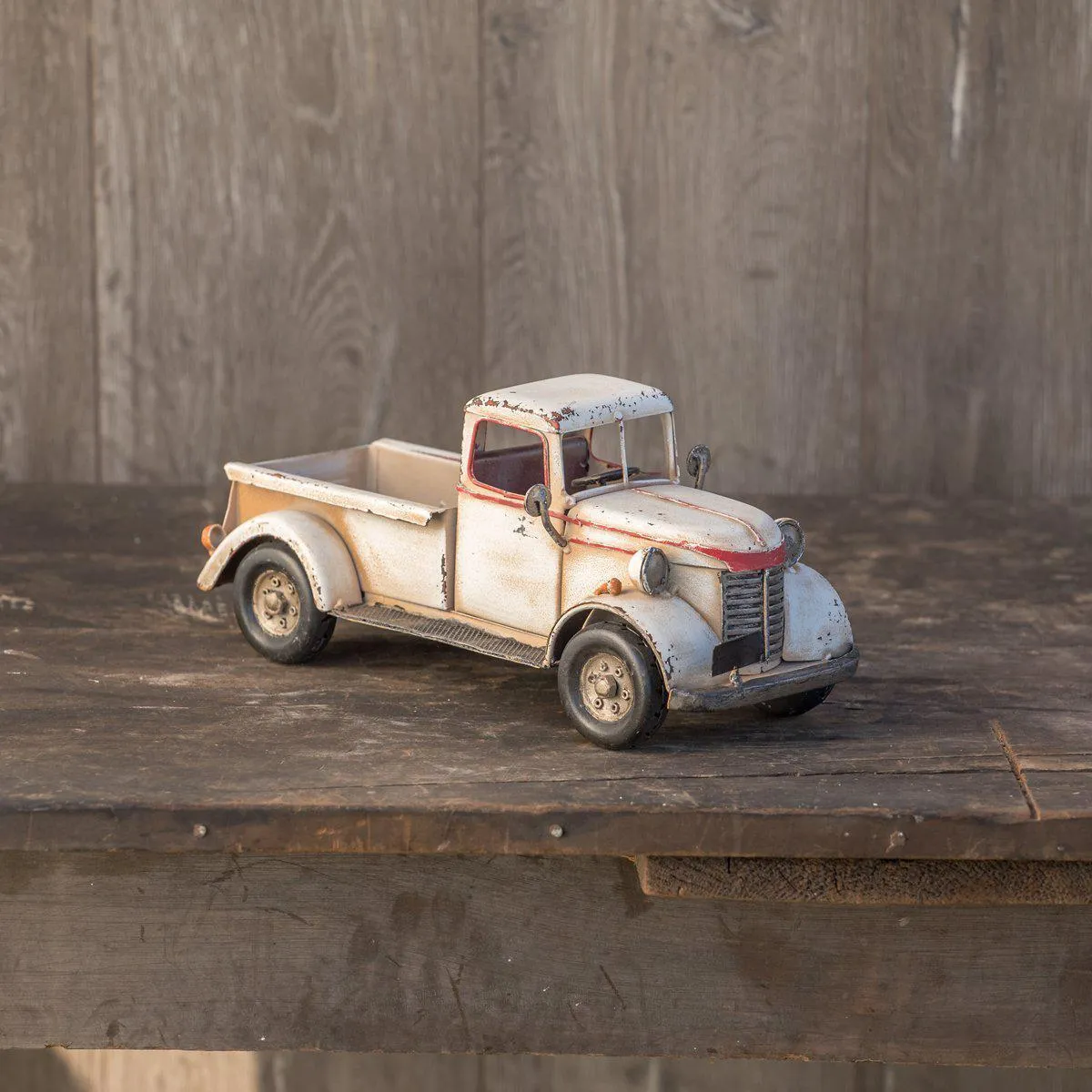 Antiqued White Metal Truck With Red Trim