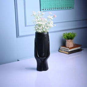 Black Glossy Ceramic Vase - Artistic Elegance dried green plant  
