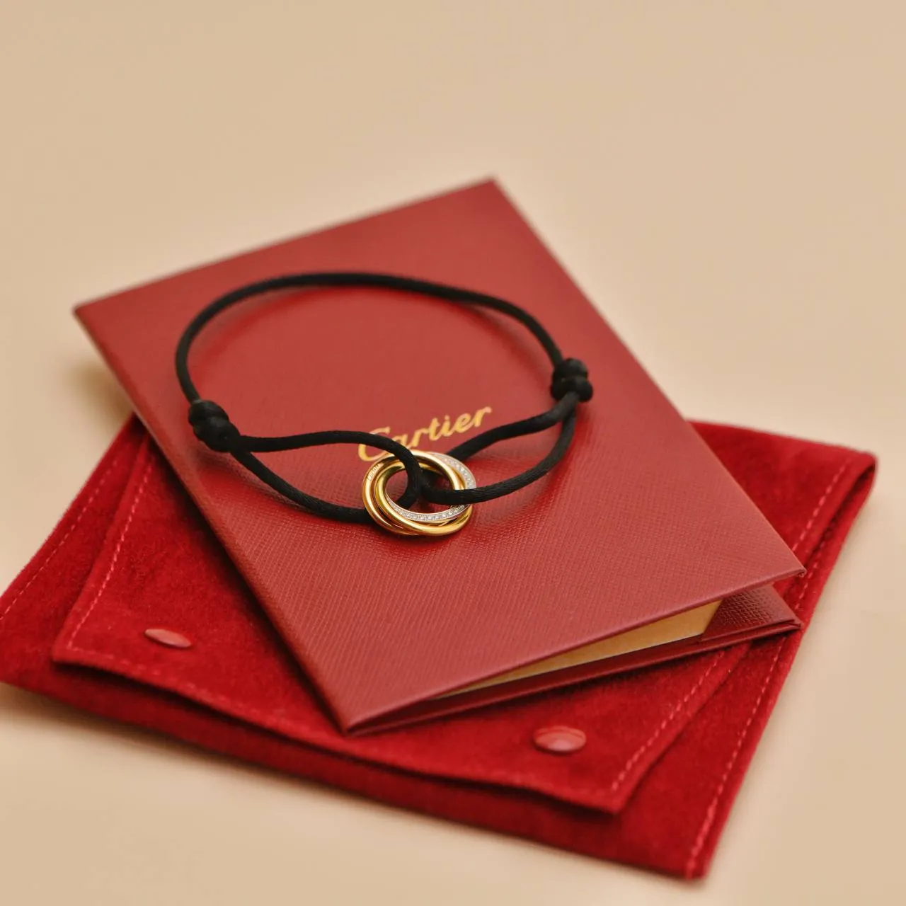 Cartier Trinity Diamond 18K Yellow White and Rose Gold Black Cord Bracelet