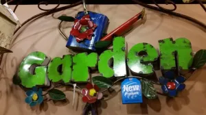 Colorful Watering Can Garden Sign decorative plants  