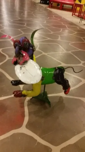 Dog with Frisbee decorative plants  