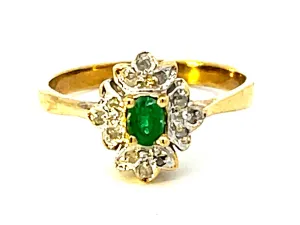 Emerald and Diamond Halo Ring in 14k Yellow Gold