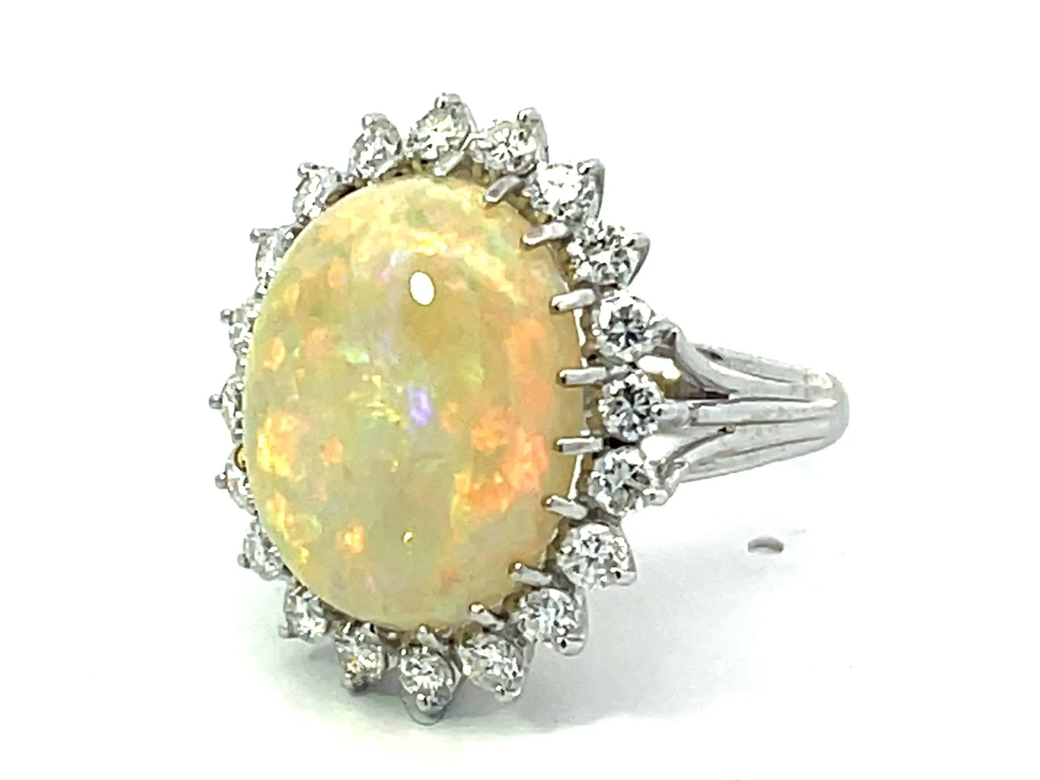 Ethiopian Opal and Diamond Halo Ring in 14k White Gold
