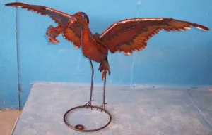 Flying Style Herin w/fish in mouth decorative plants  