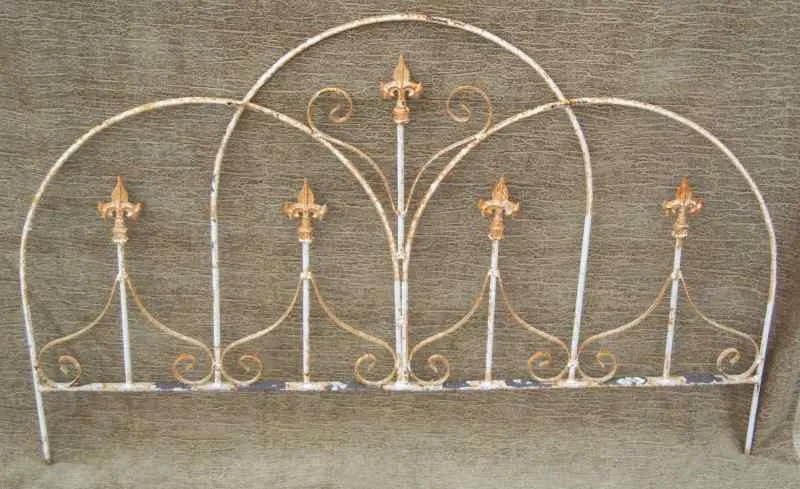 Iron Dome Arch Fence with Fleur De Lis Finials decorative plants  