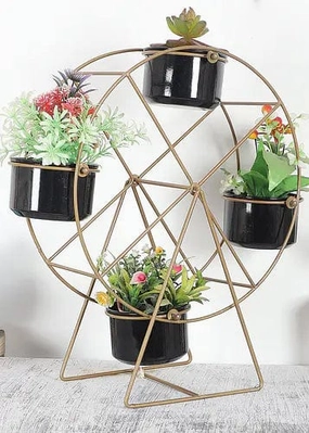 Revolving Wheel Planter Stand (Gold & Black) hanging green plant  