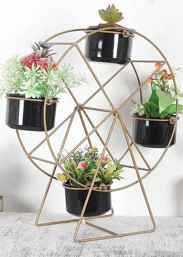 Revolving Wheel Planter Stand (Gold & Black) hanging green plant  