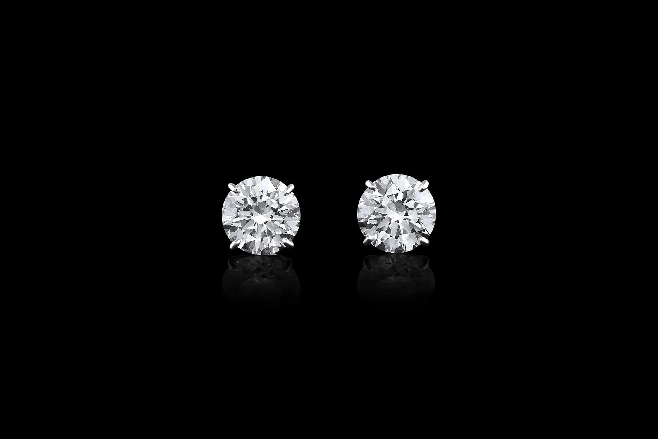 Rivire Platinum 10.01ctw Diamond Post Earrings