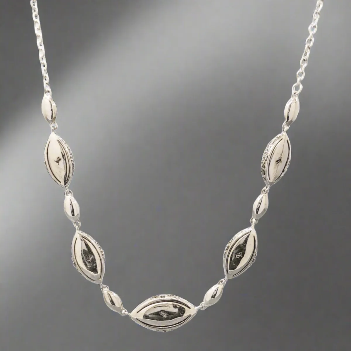 Sterling Silver CZ Graduated Station Necklace
