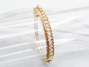 Twisting Gold and Opal Bangle Bracelet